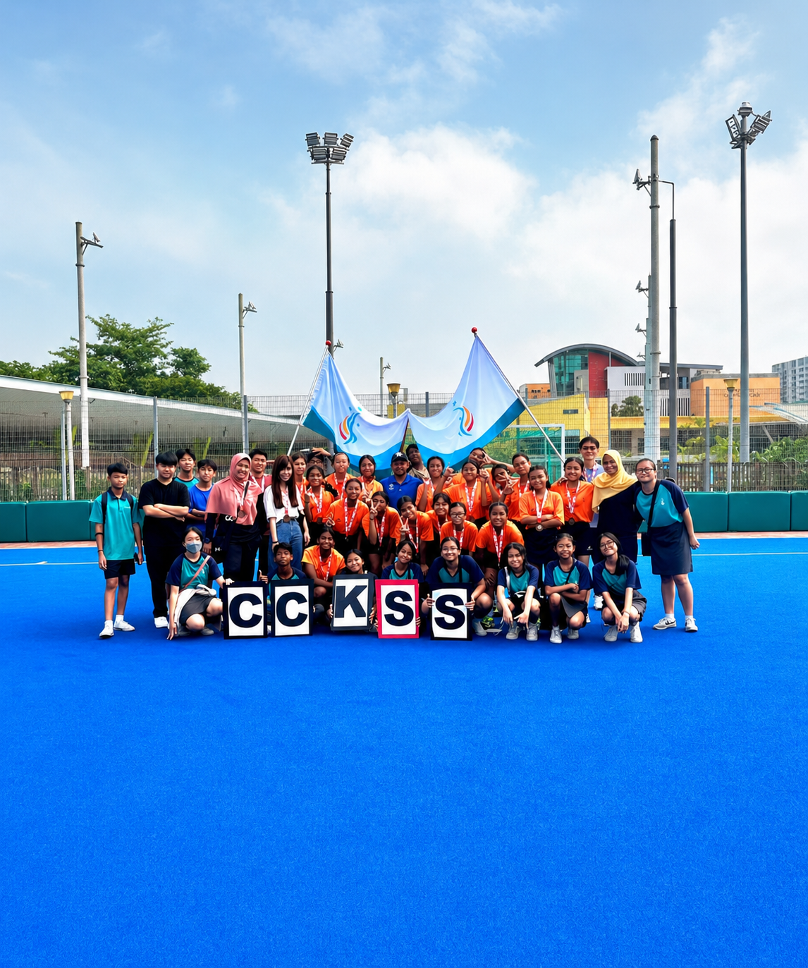 hockey girls posing as a group after the match